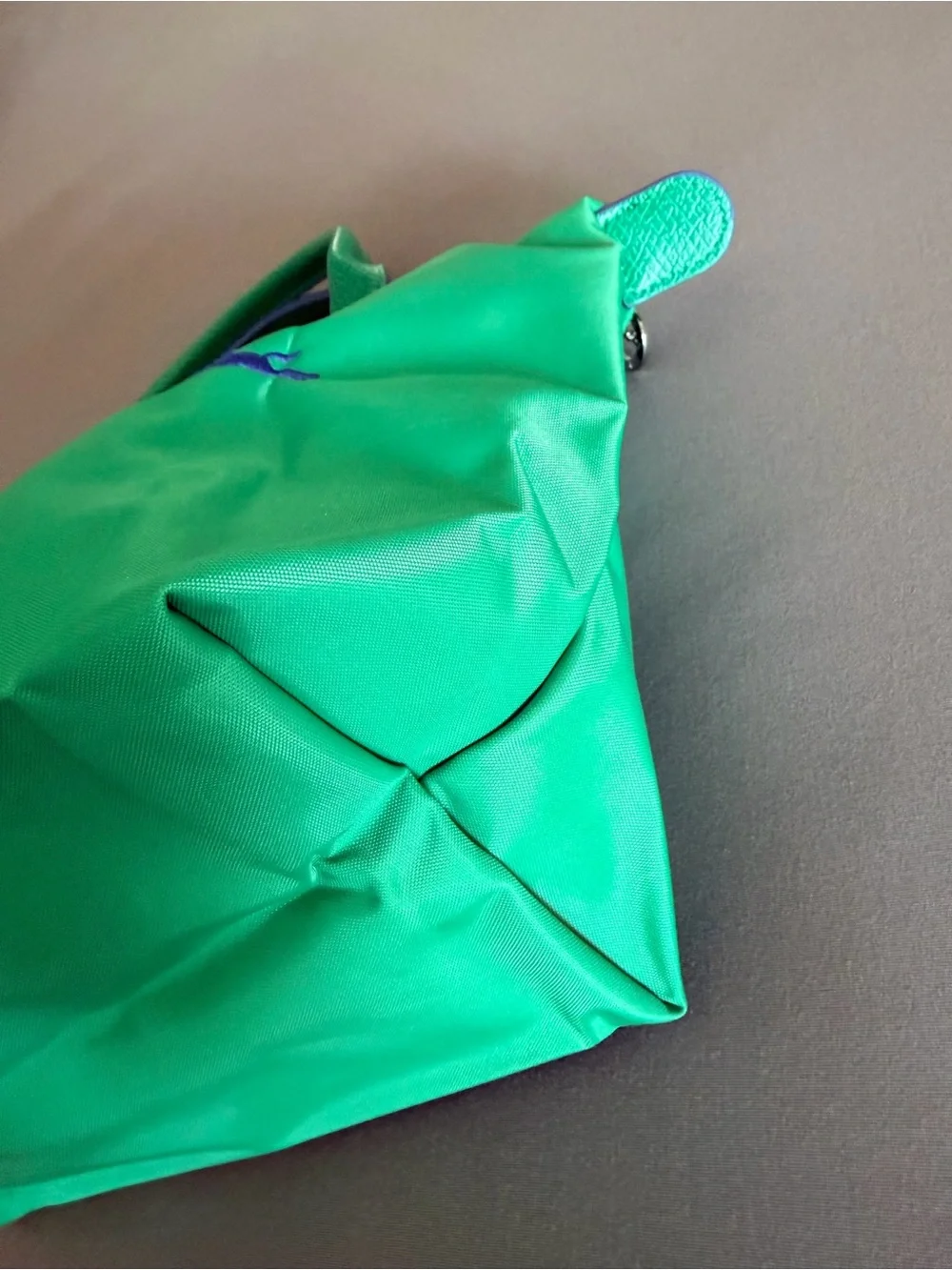 Longchamp green nylon top-handle tote with blue logo